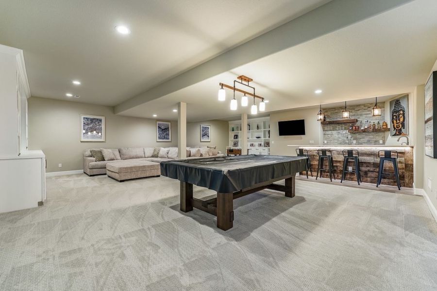 Remodeled living room by Elevation Basements